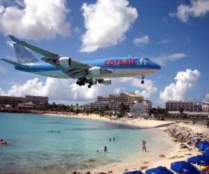 Puzzle Προσγείωση αεροπλάνο που διέρχεται πάνω από την παραλία
